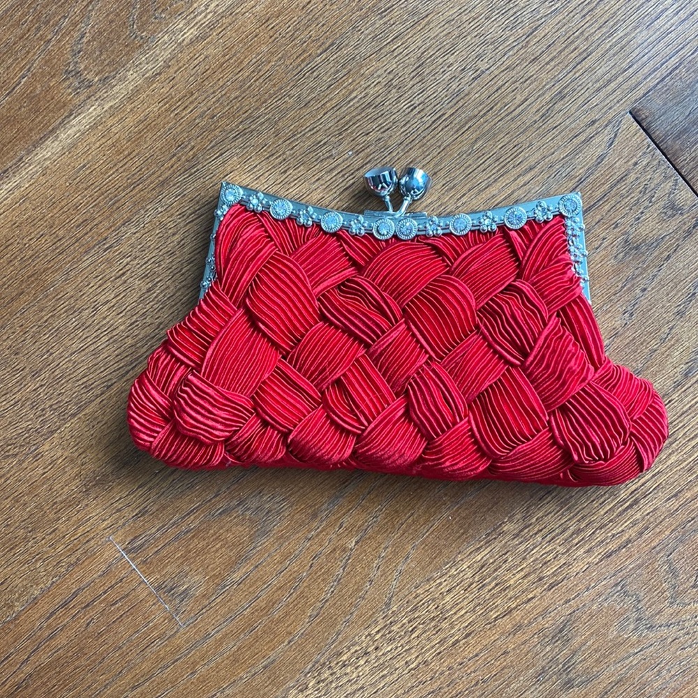 Red special occasion clutch. See photos for measurements.Used once.